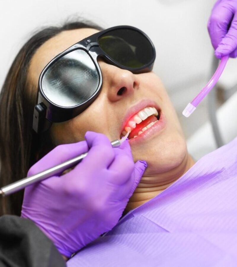 dentist-using-modern-diode-dental-laser_56854-3540