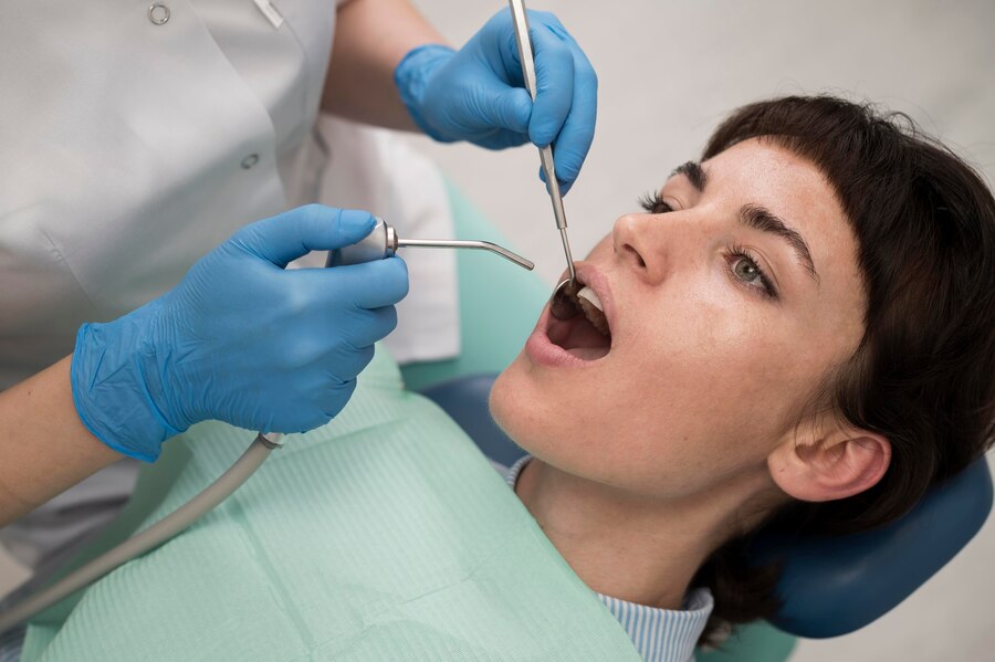 young-female-patient-having-dental-procedure-orthodontist_23-2148985756